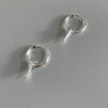 Geometric star-shaped ear clips for women with copper construction and white gold electroplated finish