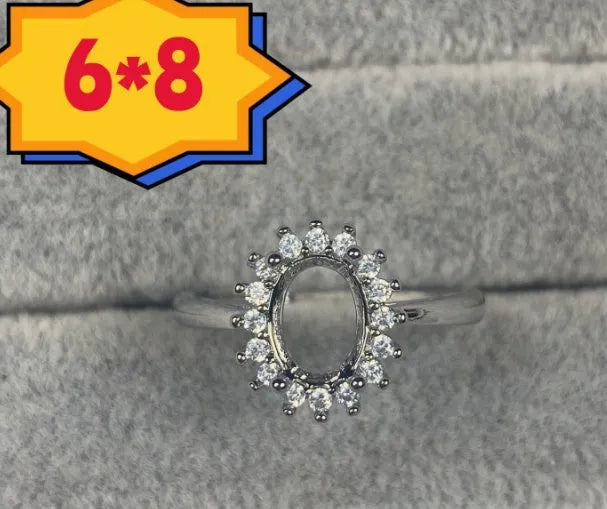 Oval denier ring with 6x8mm stone and five-pointed star detail on electroplated copper band