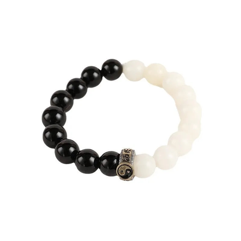Black and white obsidian bodhi seed taiji bracelet with geometric beads and mantra engraving
