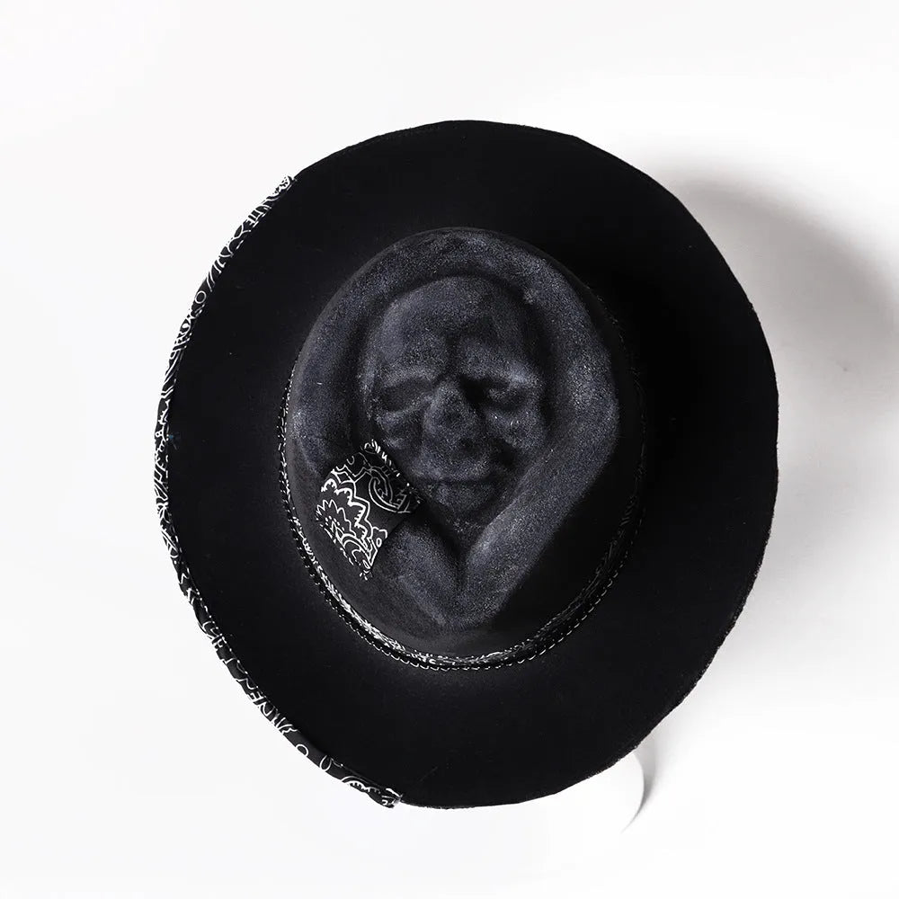 Handmade wool felt skull hat with a conical crown, shown in the colour Skull Hat.