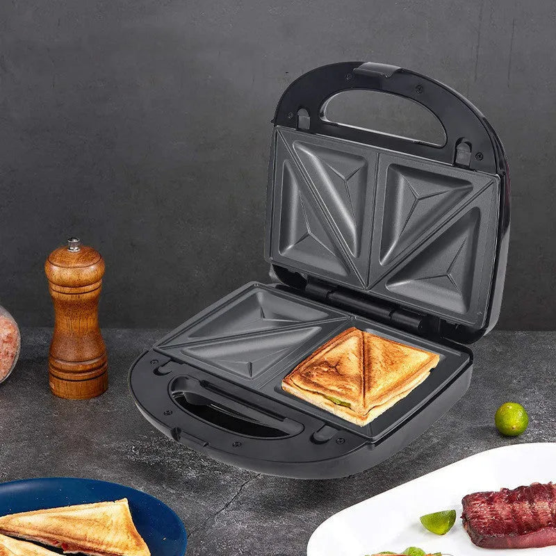 Black electric sandwich pan with double-sided heating, non-stick coating, and six exchangeable pans