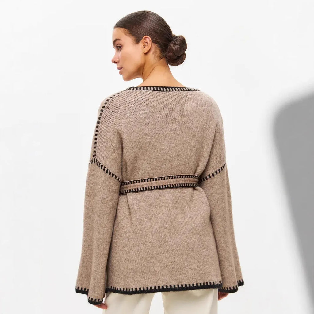 White lace-up knitted cardigan sweater coat with long sleeves and mid-length design