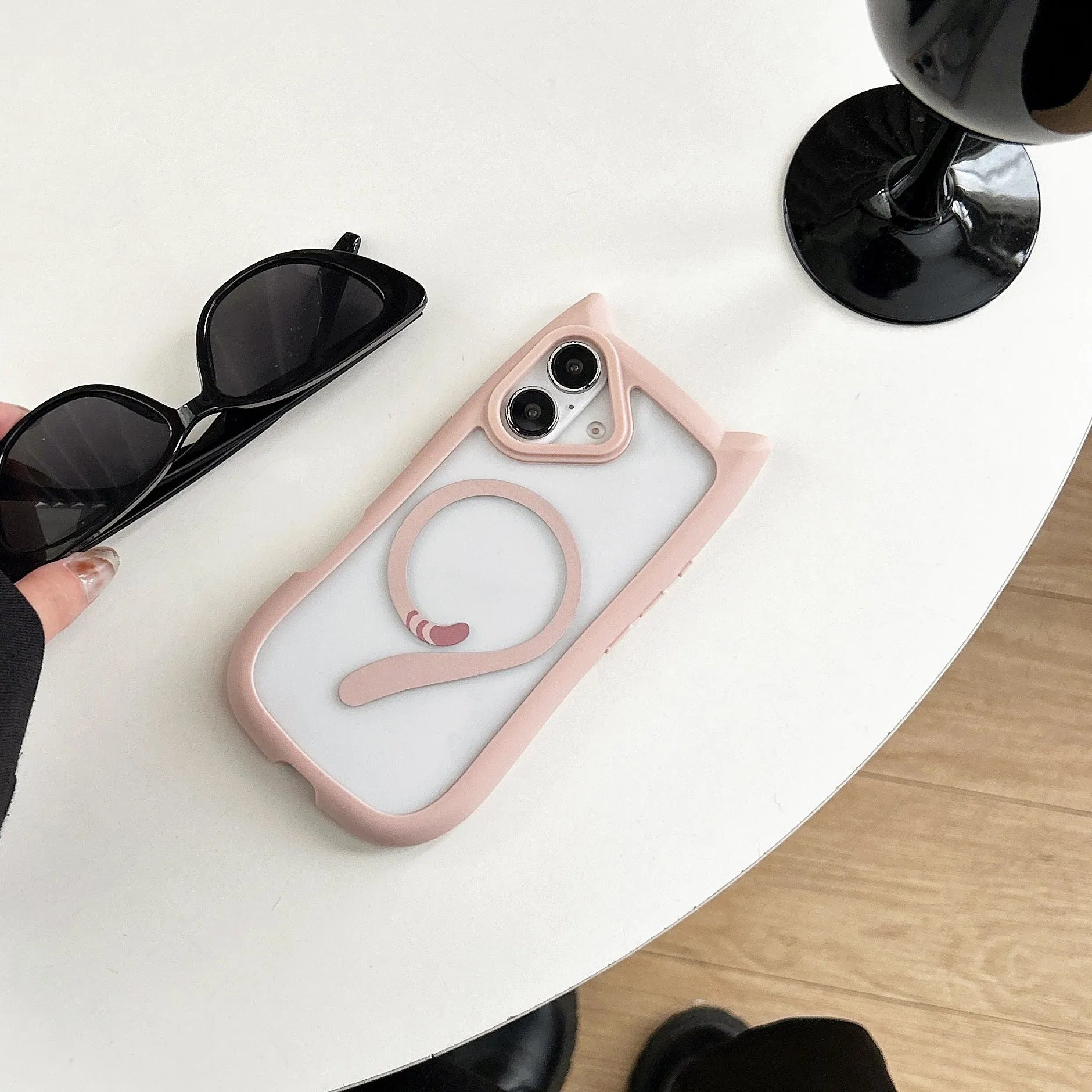 Transparent acrylic and TPU iPhone 17 phone case with magnetic suction in black, blue, grey, and pink colour options.