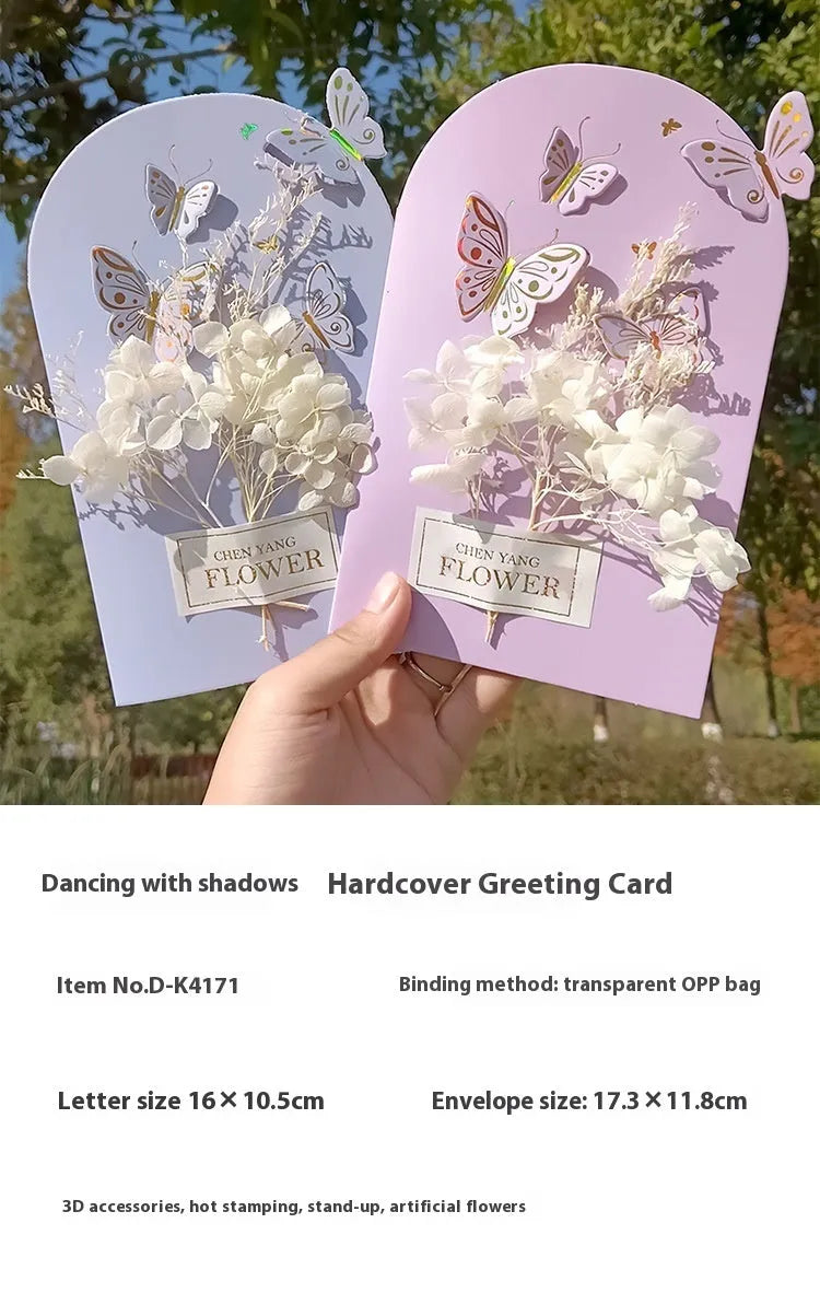 Handmade 3D boxed birthday card with butterfly shape and artificial flowers