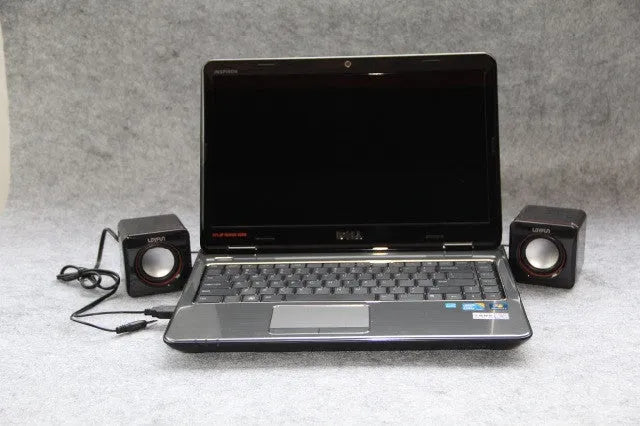 Small square black USB computer speaker with compact desktop design for PC audio