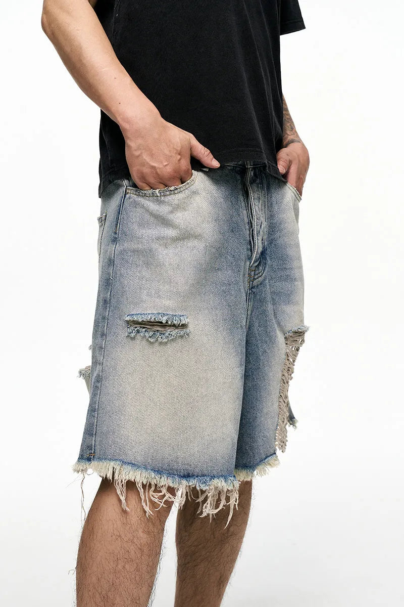 Light blue retro washed men's baggy denim shorts with wide leg cut and mid waist