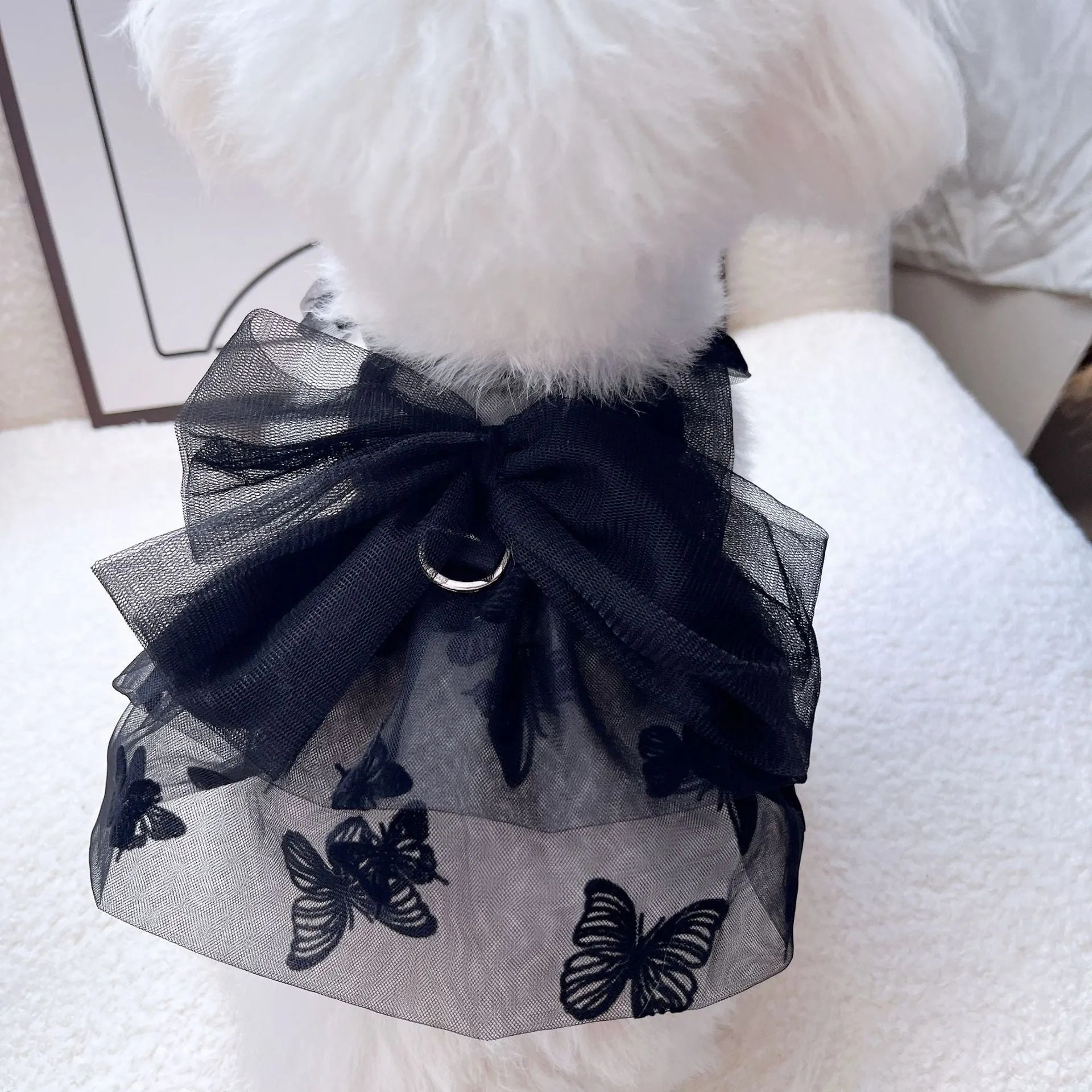 Black gauze princess tulle skirt for a small dog or cat on a white background.