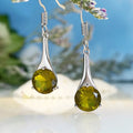 A pair of simple olive green drop-shaped earrings with a retro style on a white background.