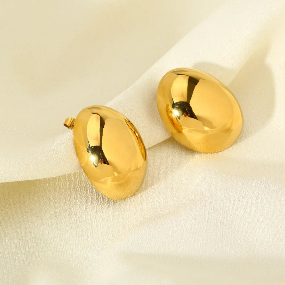 Geometric stainless steel earrings with glazed surface and line elements in gold colour DFE139
