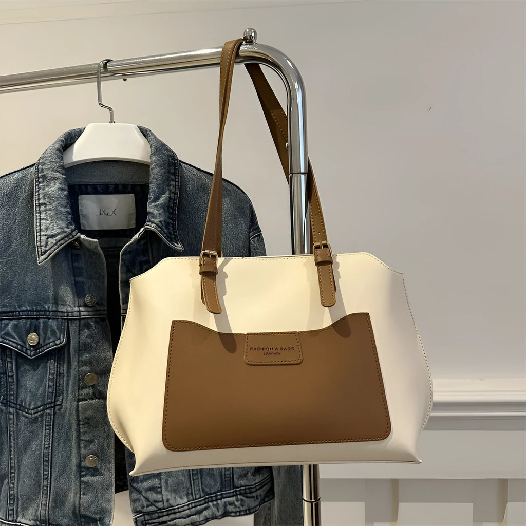 PU tote bag in horizontal square shape with double shoulder straps and visible sewing line detailing