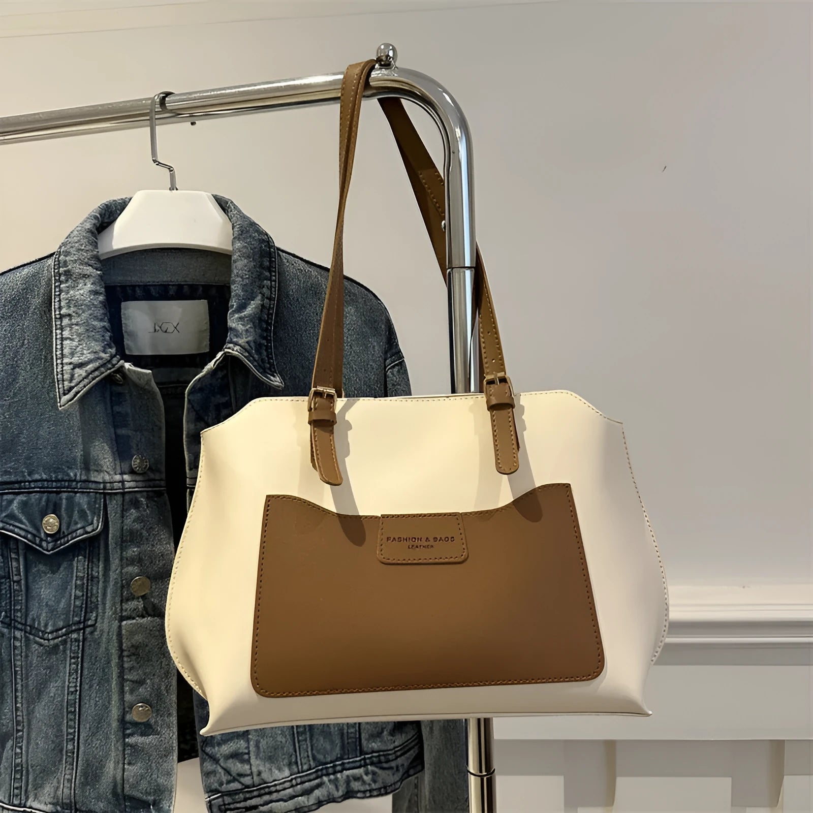 PU tote bag in horizontal square shape with double shoulder straps and visible sewing line detailing