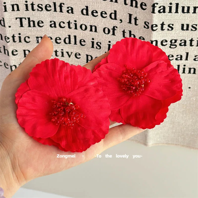 Handmade earrings exaggerated flower shape red steel needle European style women