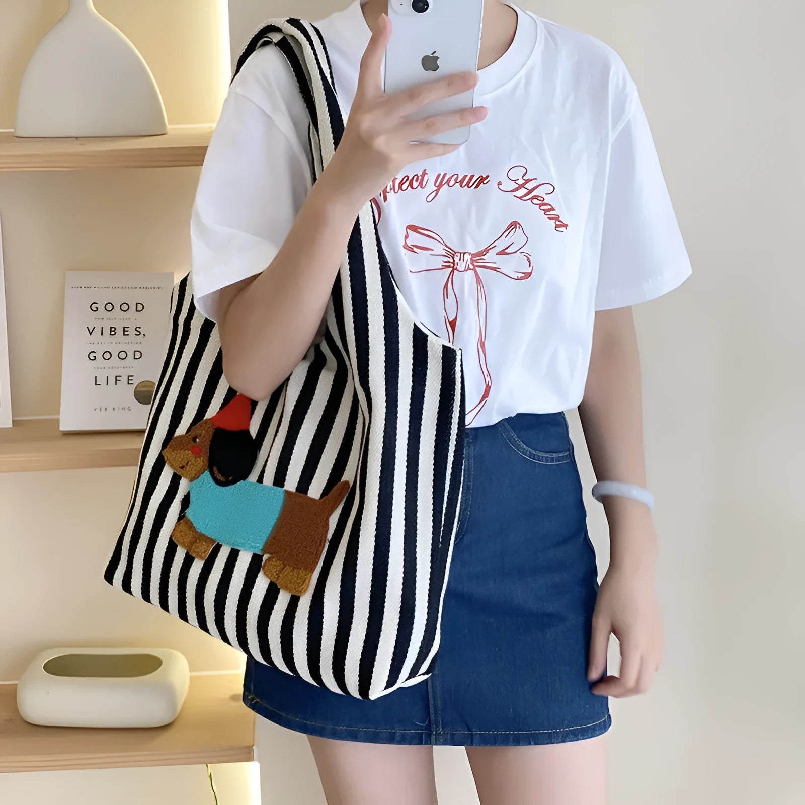 Soft canvas shoulder bag with red stripes and cartoon embroidery of a puppy wearing a red hat, square vertical shape, double shoulder straps