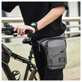Men's nylon crossbody cycling leg bag in black colour showing waterproof anti-theft features