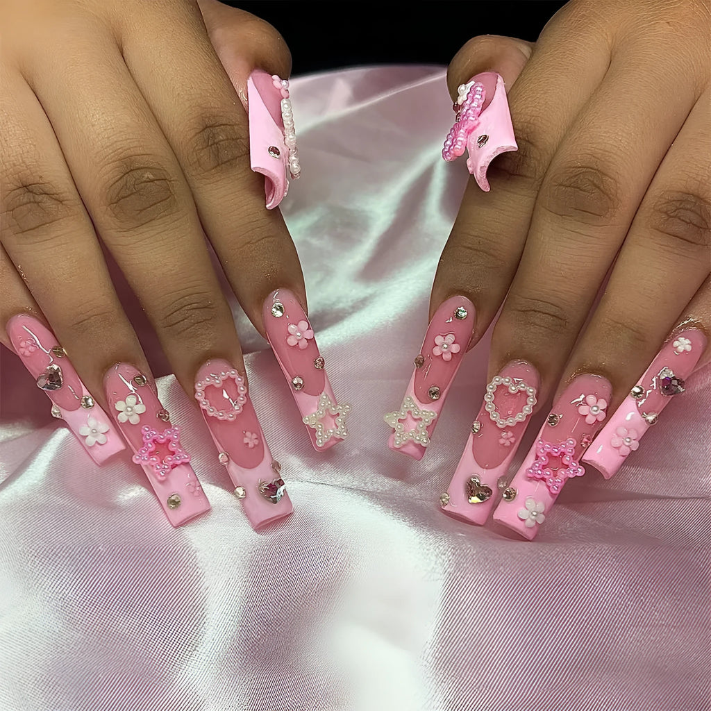 Decorative false nails with extended water pipe French tips, bow detailing and diamond accents in colour XB-70-48