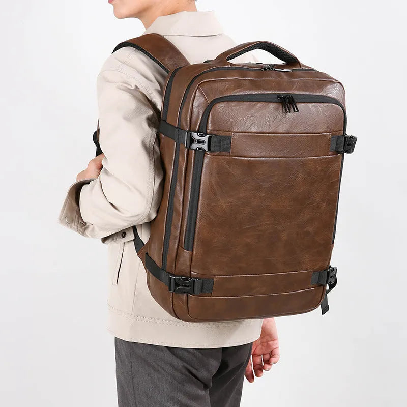 Multi-functional scalable computer backpack in solid black colour, PU waterproof finish, 20-35 litre capacity