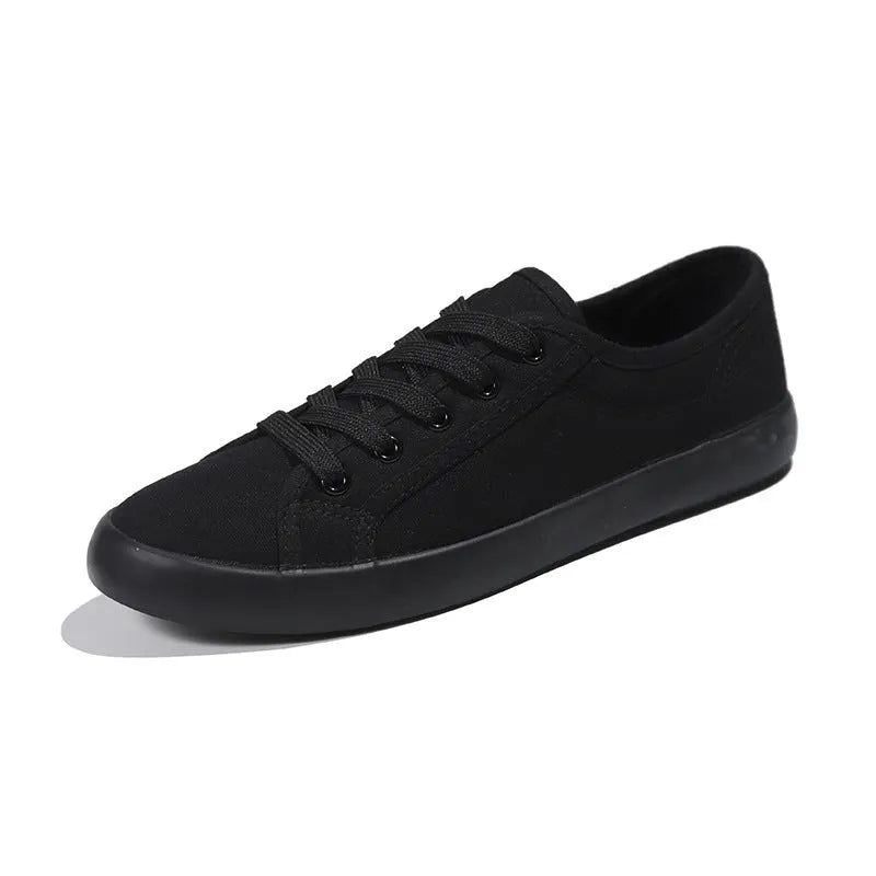 Korean style all black women's flat canvas work shoes with lace-up front