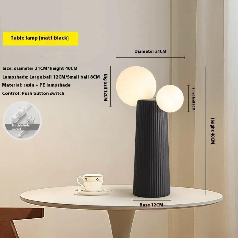 Modern minimalist cactus bedside lamp in milk coffee colour, resin and PE lampshade, 21cm diameter 40cm height, on bedside table