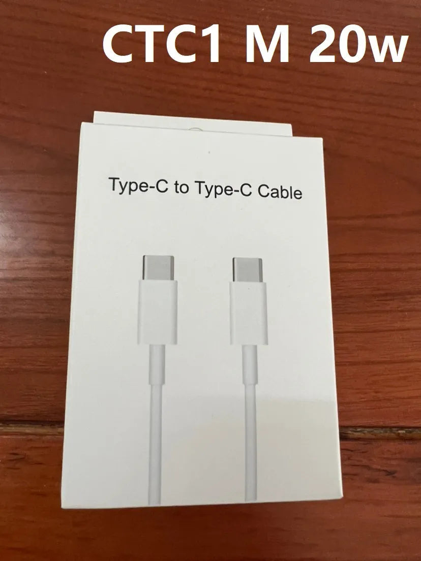 White 20W USB-C PD fast charger with UK plug and a coiled charging cable.