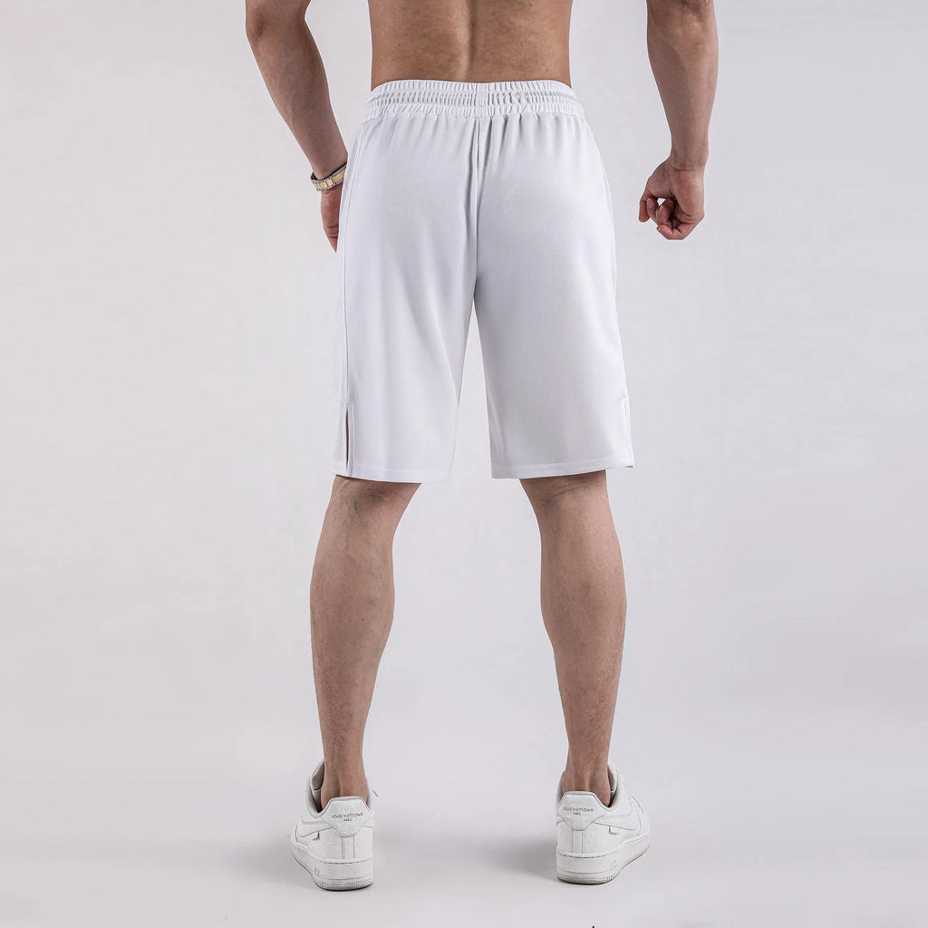 Men's black quick-drying mesh fitness shorts with an elastic waistband, shown in a loose, capri-length style.