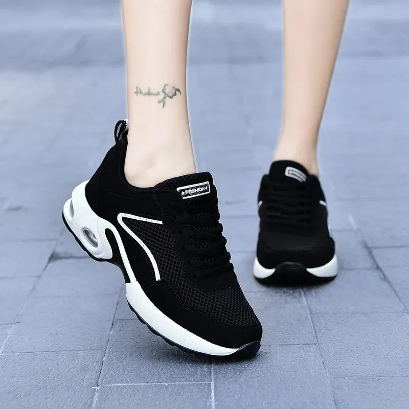 Breathable mesh low-top casual sneaker for elderly with flat heel and shallow mouth in black and white and black and red colour options