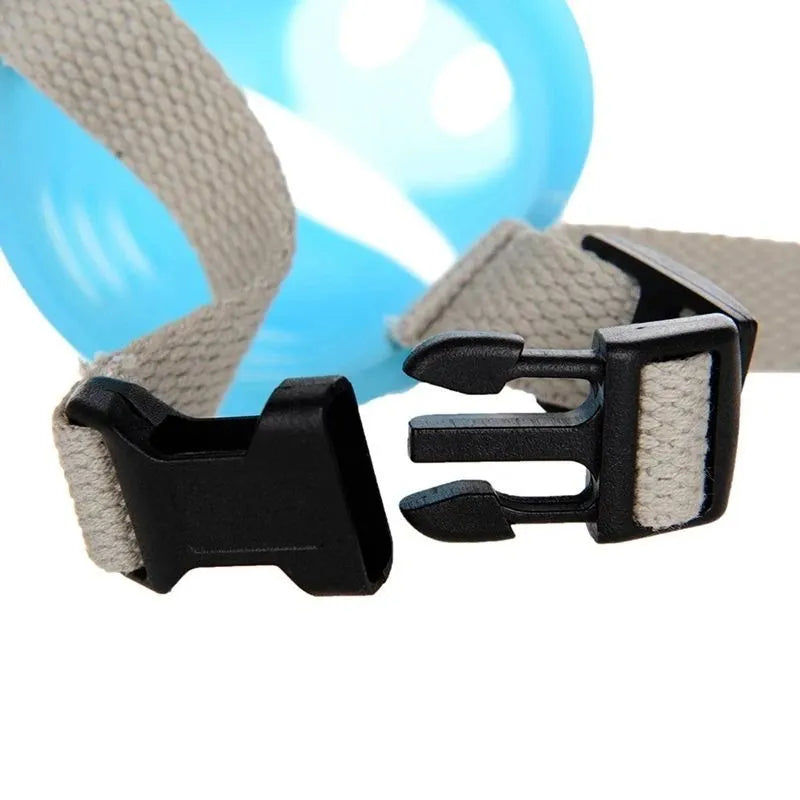 Blue silicone dog muzzle for long-mouthed breeds showing flexible construction