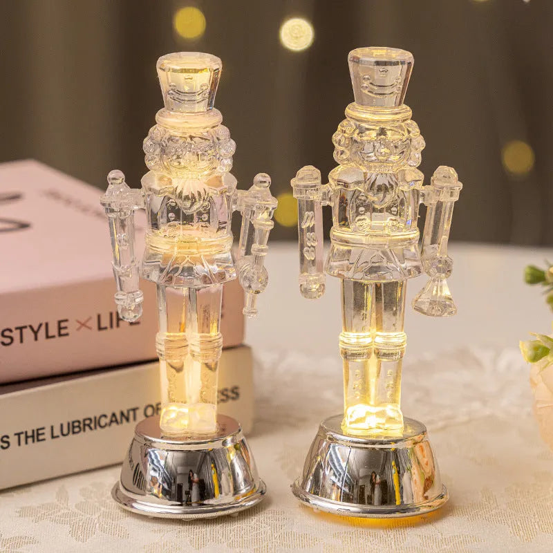 Transparent plastic walnut soldier Christmas ornament nutcracker decoration on desktop.