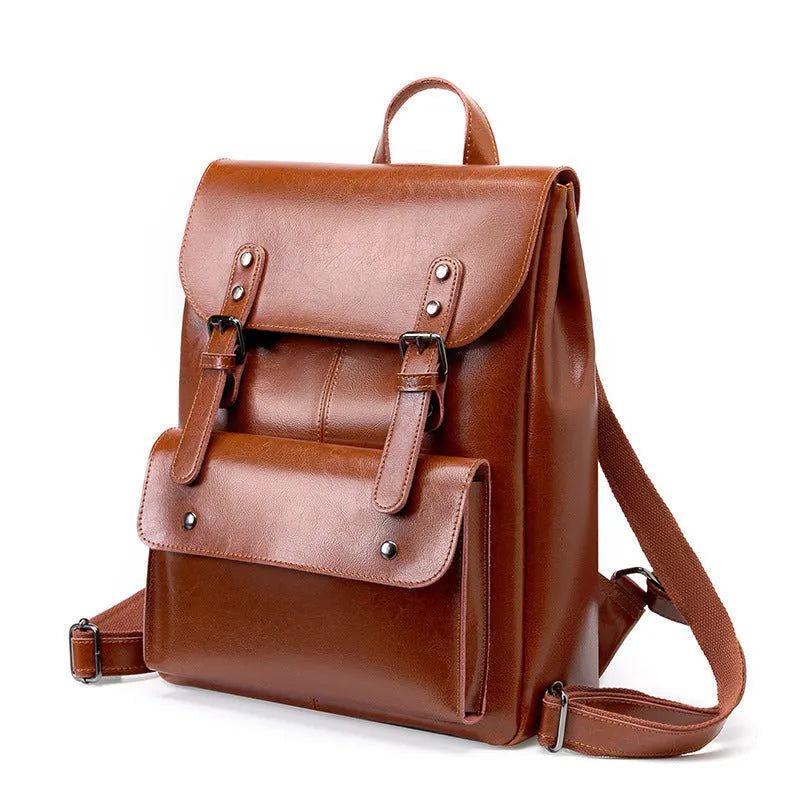 Genuine leather cowhide backpack with hard texture construction and internal lining for laptop organisation