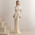 Women's long sleeve slim fit dress with high collar and pleated backless detail in solid colour
