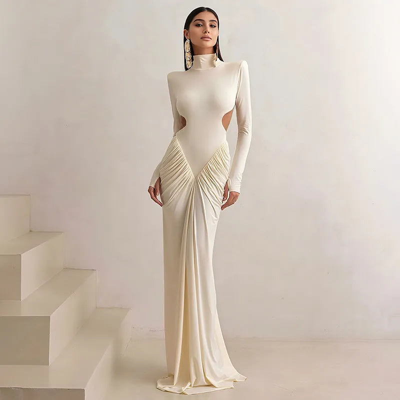 Women's long sleeve slim fit dress with high collar and pleated backless detail in solid colour