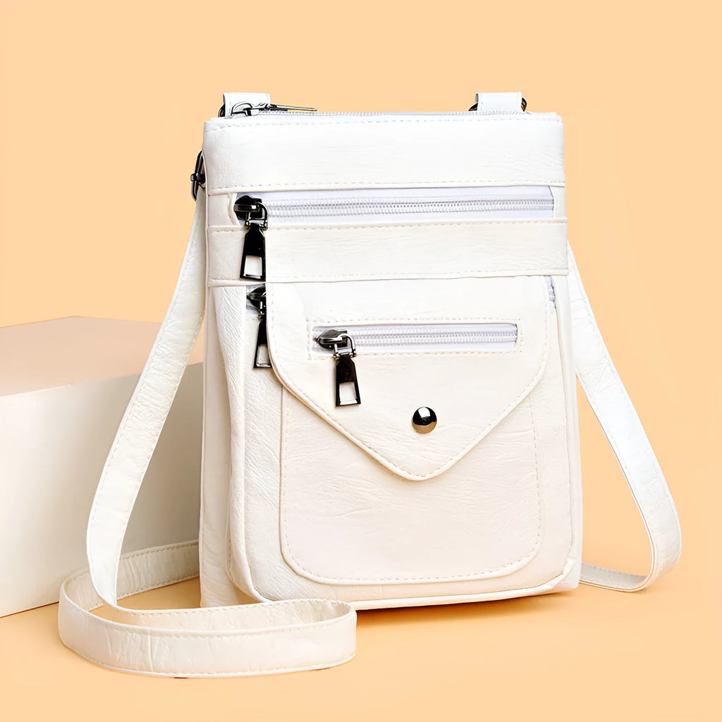 Vertical square crossbody mobile phone bag for women in PU material with sewing line detailing
