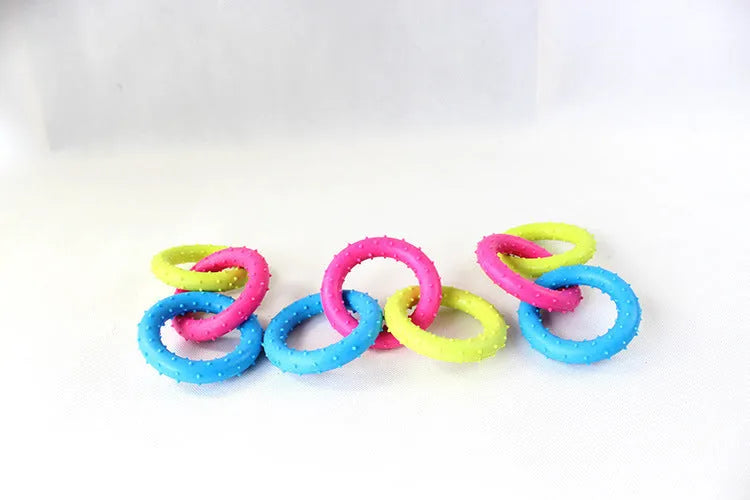 TPR rubber three-chain link dog molar chew toy for large breed dogs on a white background.