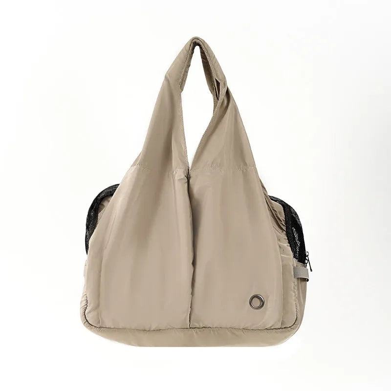 Apricot cloth pet handbag with medium 41cm by 16cm by 28cm dimensions for dogs and cats