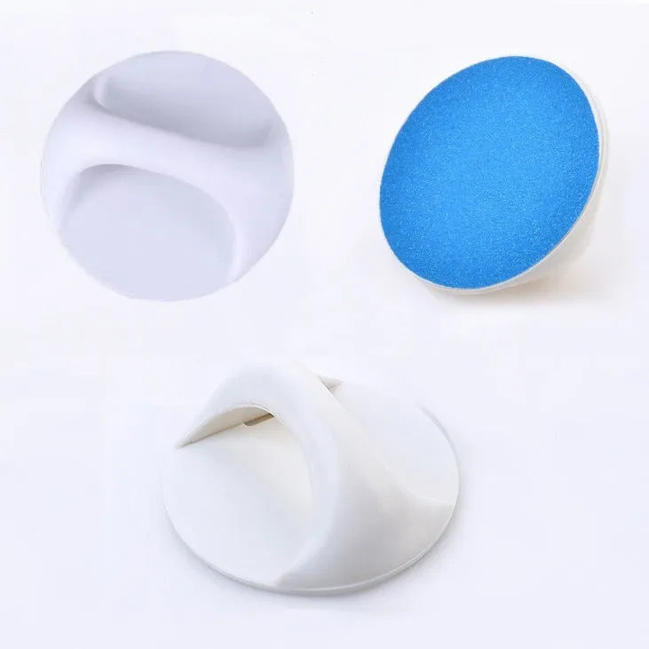 A square dog nail scratch board with an ergonomic handle, shown in blue with a replaceable sandpaper surface.