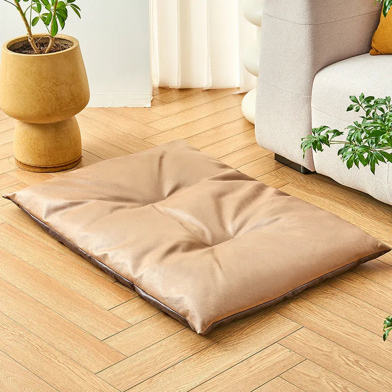 Blue and coffee coloured summer cooling pet bed for cats and dogs shown in four different sizes