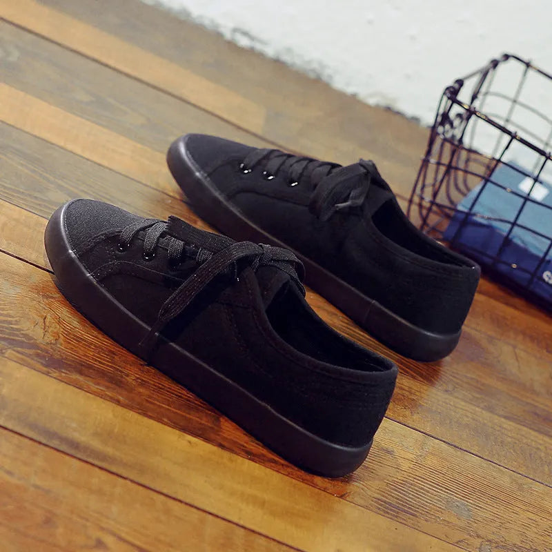 Korean style all black women's flat canvas work shoes with lace-up front