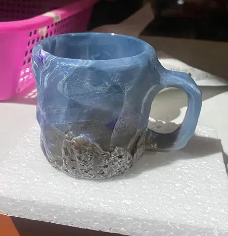 Purple resin mineral crystal coffee mug with handle showing 3D texture and 10cm height