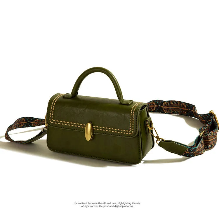 PU leather messenger bag in square vertical shape with sandwich pocket and interior organisation compartments