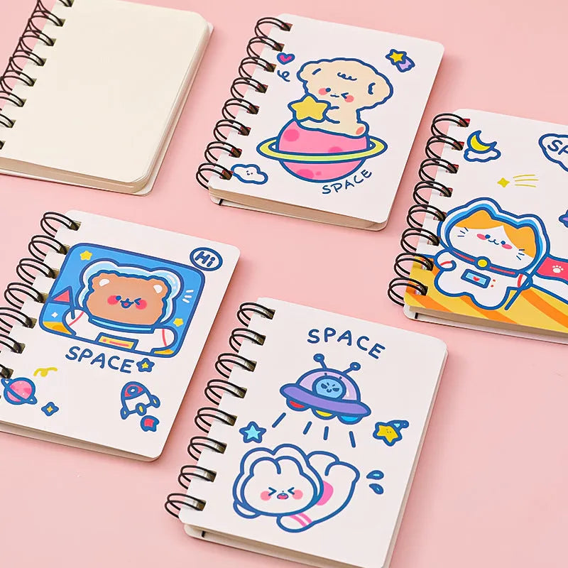 Astronaut flipped portable pocket flipper notebook showing space-themed cover designs at 10.5cm by 8cm
