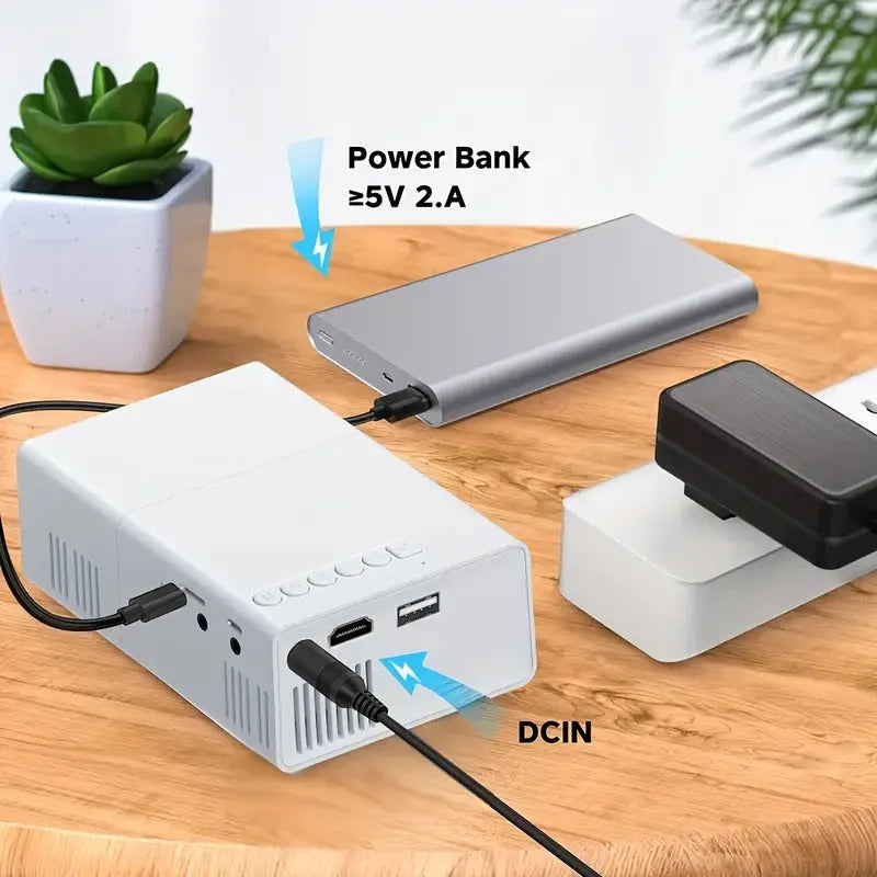 M100 portable LED projector showing black and white colour options with remote control