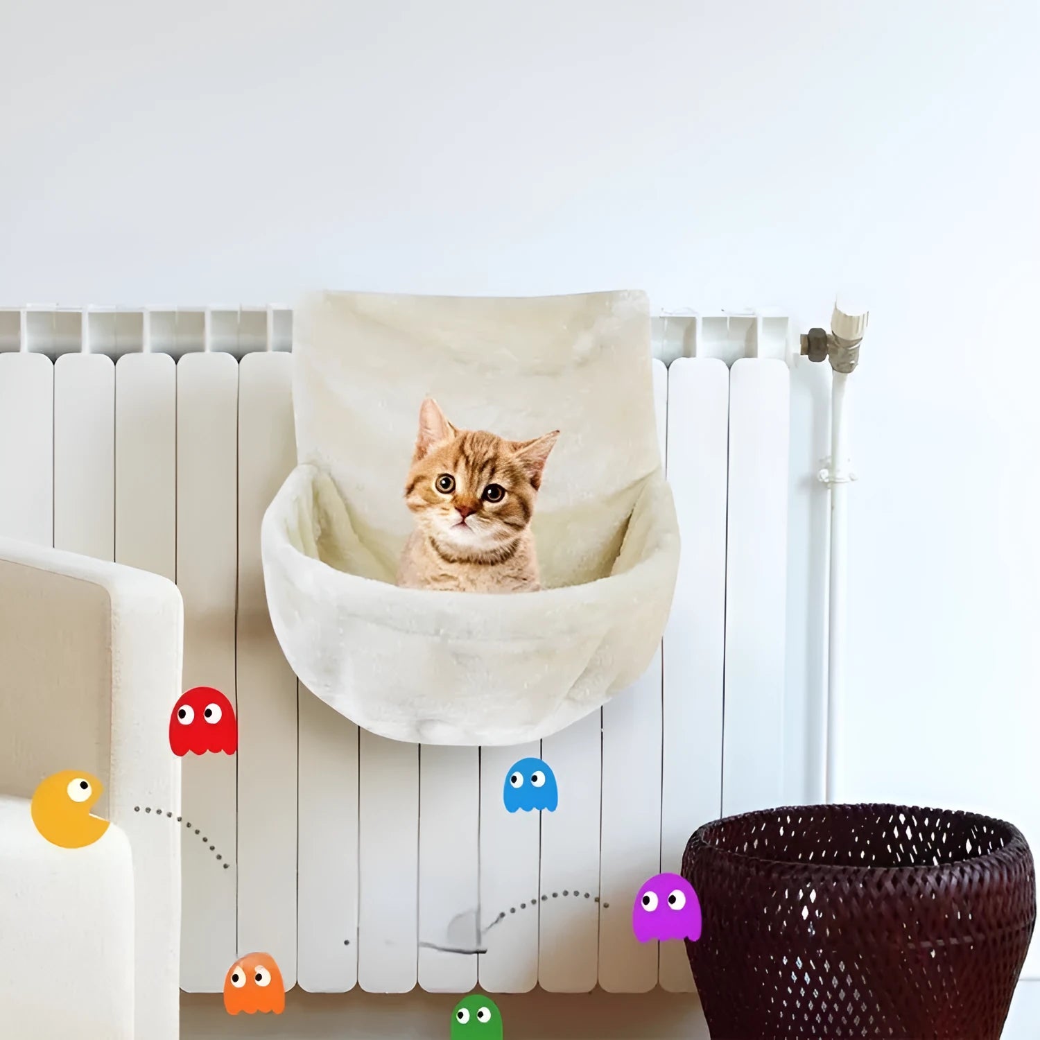 Grey iron frame cat hammock with fleece cloth bed suspended for a cat to lounge.