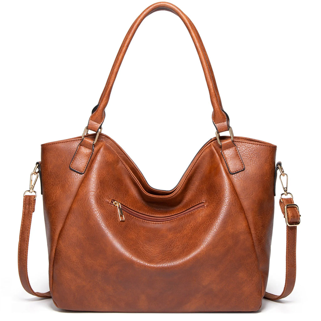 Women's retro PU leather bucket shoulder messenger bag in brown with small bag, placed on a neutral surface showing front view and strap.