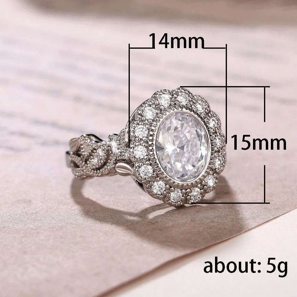 Women's geometric ring with round zircon stone and full diamond plating in white gold colour.