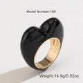 Three-dimensional enamel heart ring in black, pink, purple, or red colour options