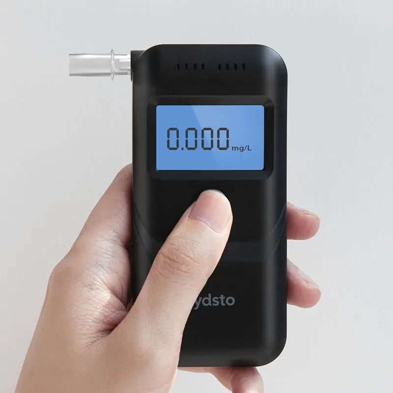 Black household alcohol breath tester for drinking checks and drunk driving detection