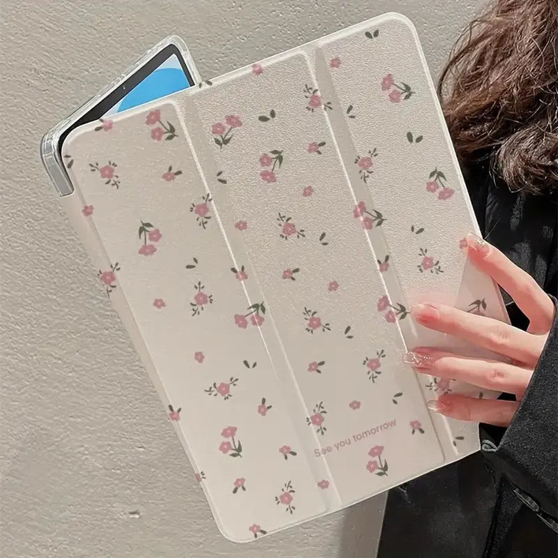 Transparent floral patterned iPad case with tri-fold magnetic stand open
