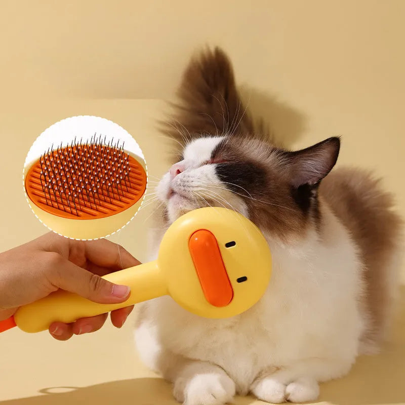 Small yellow duck comb for cat and dog hair removal with open section design