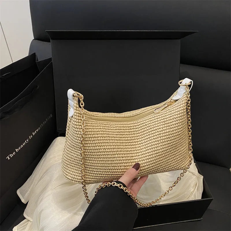 Straw woven shoulder tote bag in horizontal square shape with sandwich pocket and mobile phone compartment