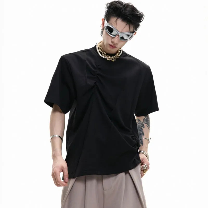 Men's loose fit grey cotton t-shirt with a textured pleated design and round neck.