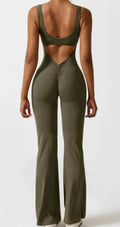 Women's black milk silk yoga bodysuit with seamless construction and mid-waist design